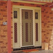 Aliminium-Diamond-Grille-Door-with-Side-Panerls